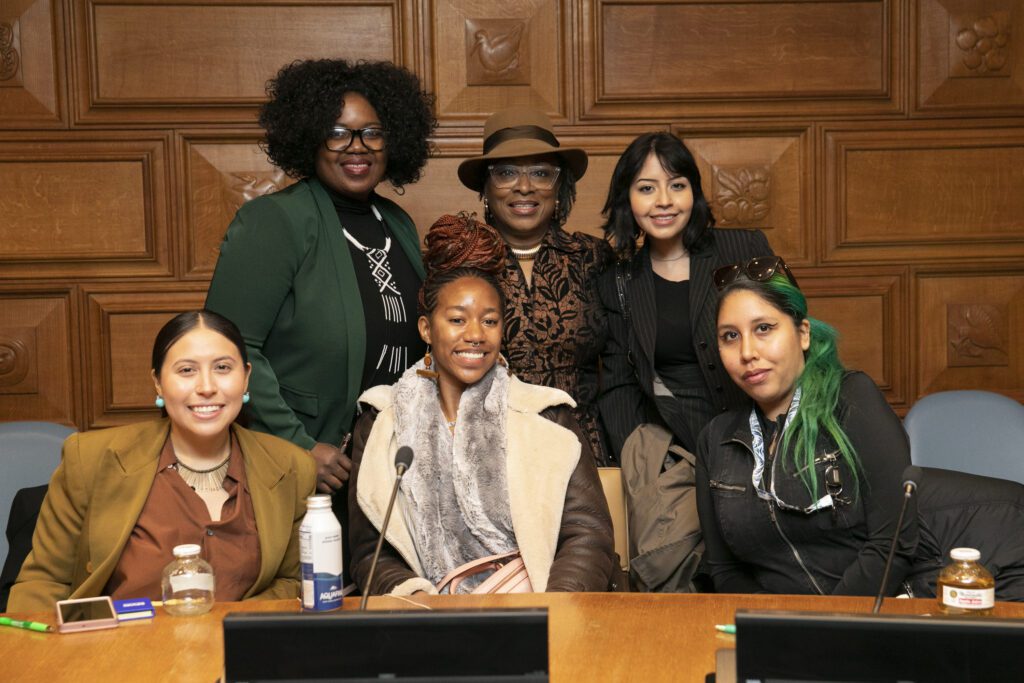 Recent Training Institute graduates attending a panel at the UN.