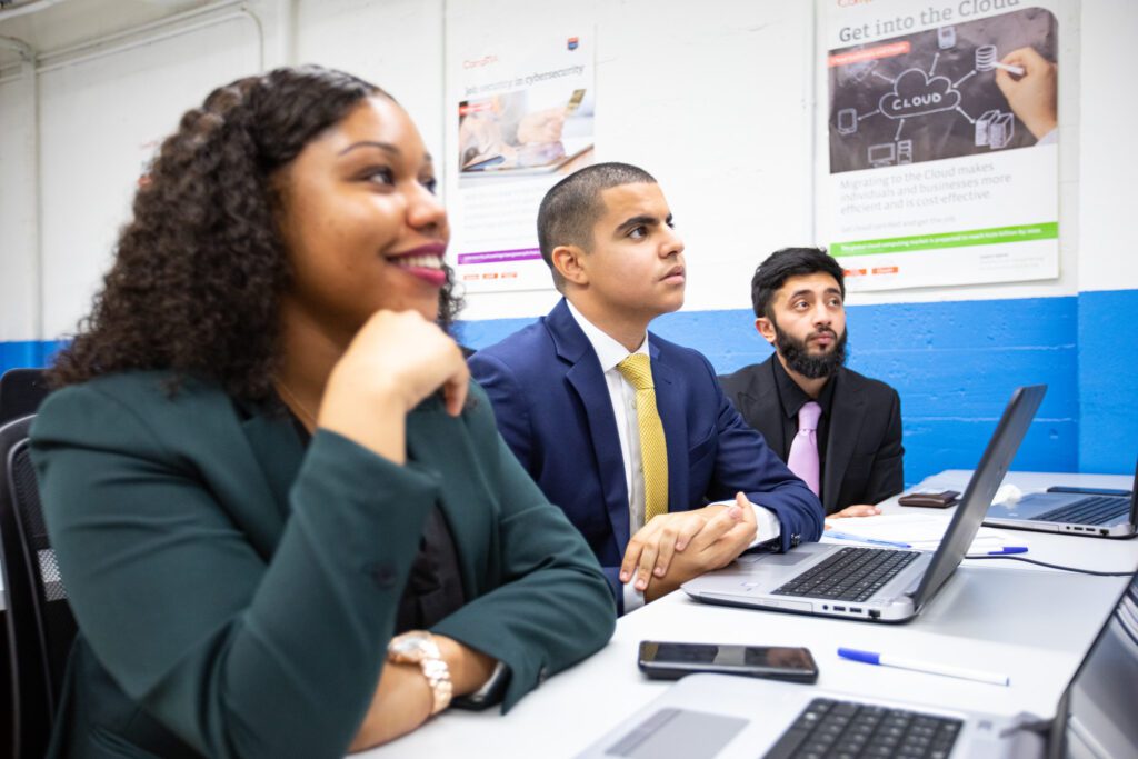 NPower Students as desk with laptops