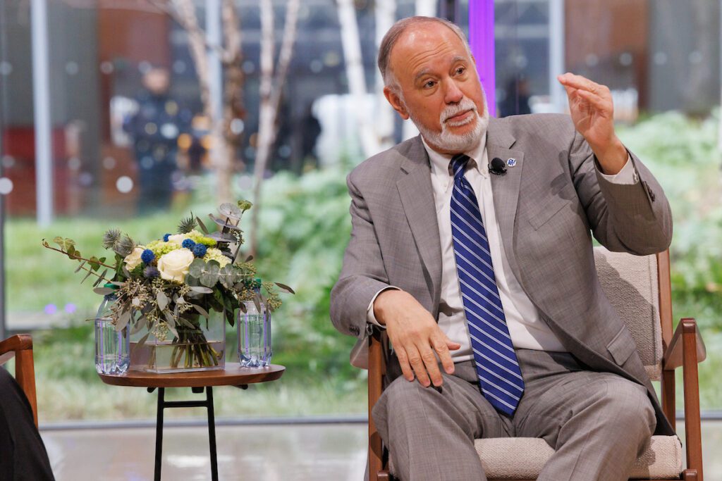 CUNY Chancellor Dr. Félix Matos Rodríguez on stage at The Times Center.