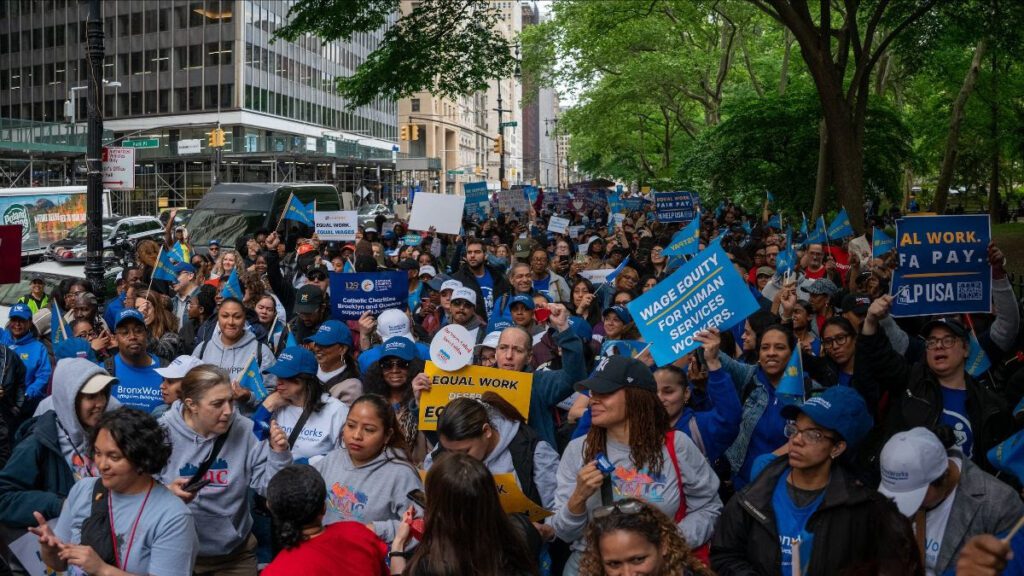 A large crowd of human services workers at City Hall at the Just Pay rally for pay equity.